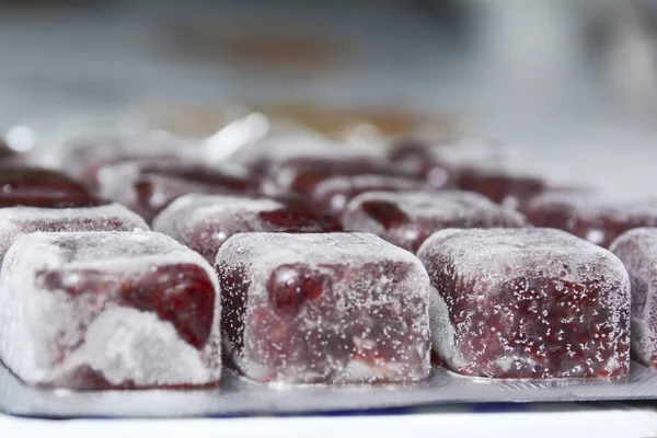 close up photo of frozen bloodworms