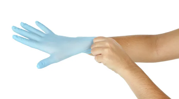 putting on protective gloves